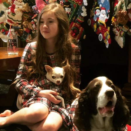 Lucy Paez with her two pet dogs